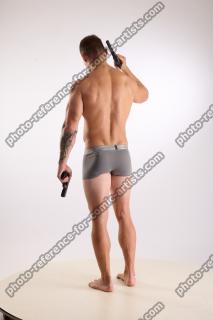 Piero Pose with Guns